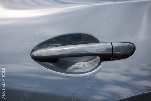 Door handle of a new grey car