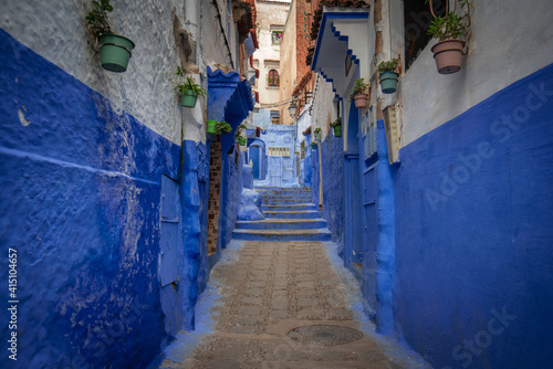 Street of the blue painted city Chefchaouen in Morocco. © mitzo_bs
