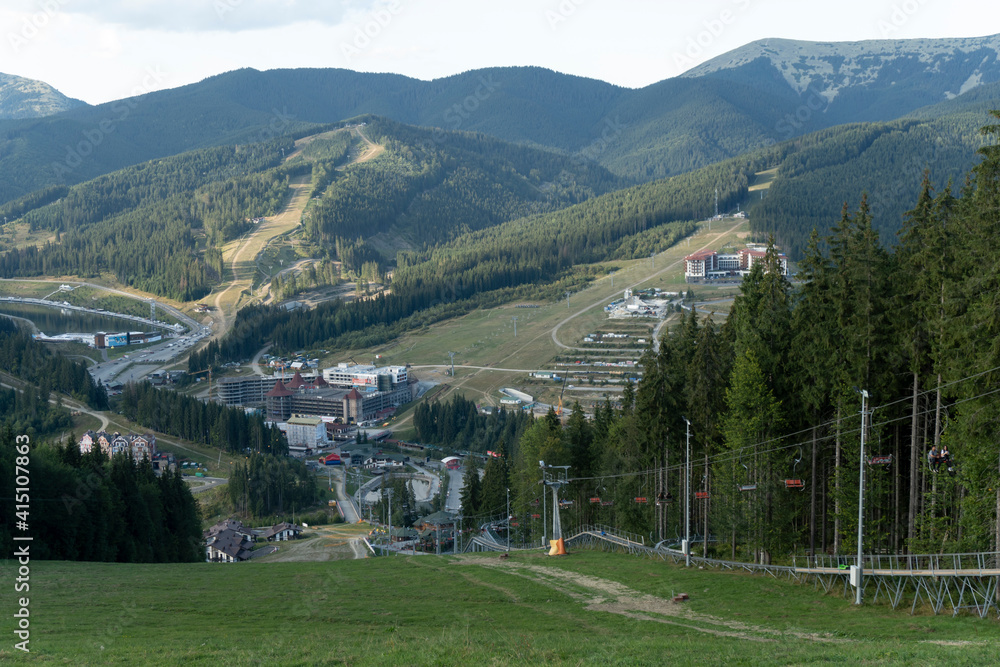 Bukovel panorama view from the top of the hill at summer, famous Ukrainian resort, green grass, scenery view, no people..