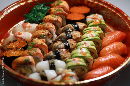 Mixed sushi roll and sashimi platter. Party Platters.