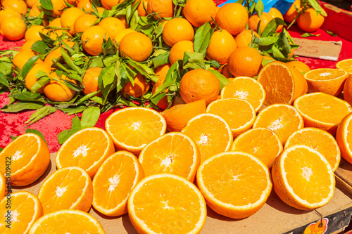 Italy, Apulia, Metropolitan City of Bari, Locorotondo. Oranges for sale in an outdoor market.