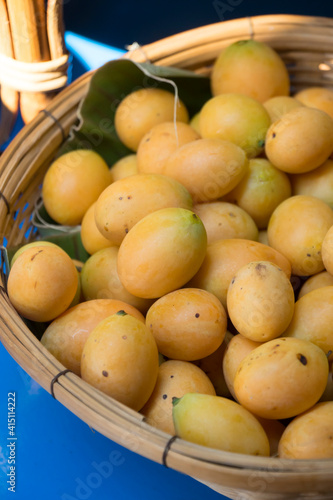 Fresh Sweet Yellow Marian Plum or Plum Mango that gardeners put in baskets to be sold