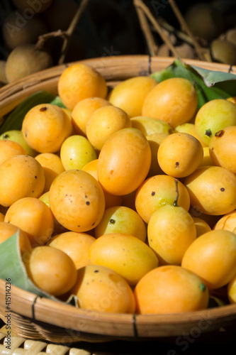Fresh Sweet Yellow Marian Plum or Plum Mango that gardeners put in baskets to be sold