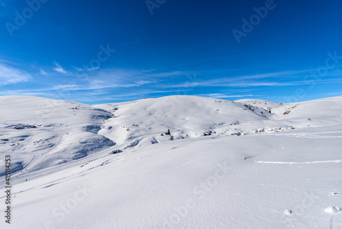 Altopiano della Lessinia (Lessinia Plateau) in winter with snow and Monte Tomba (Tomb Mountain), Regional Natural Park, near Malga San Giorgio, ski resort in Verona province, Veneto, Italy, Europe.