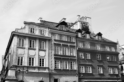 Beautiful facades of the historic edifices in the Old Town (Stare Miasto), Warsaw, Poland. Black and white photo