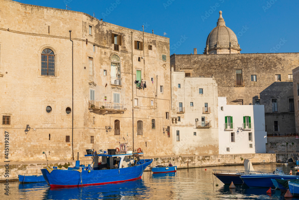 Italy, Apulia, Metropolitan City of Bari, Monopoli. Porto di Monopoli. Fishing boats tied up in the harbor.