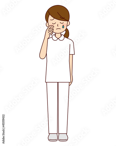 泣いている女性看護師