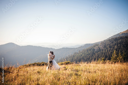 Happy Young Couple Wedding in Beautiful Mountains