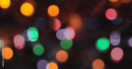 Colored bokeh abstract background. Decoration at Christmas holiday.