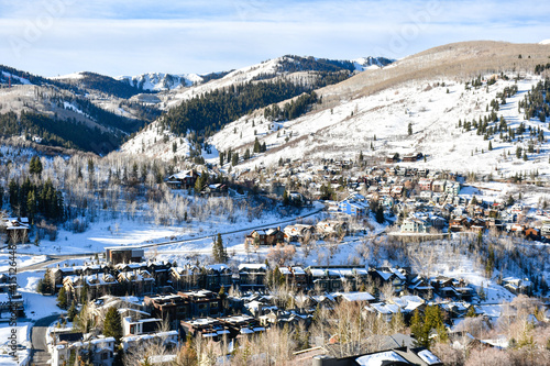 Vacation homes on the hillside in Deer Valley and Park City resort ski area in Utah during winter time photo