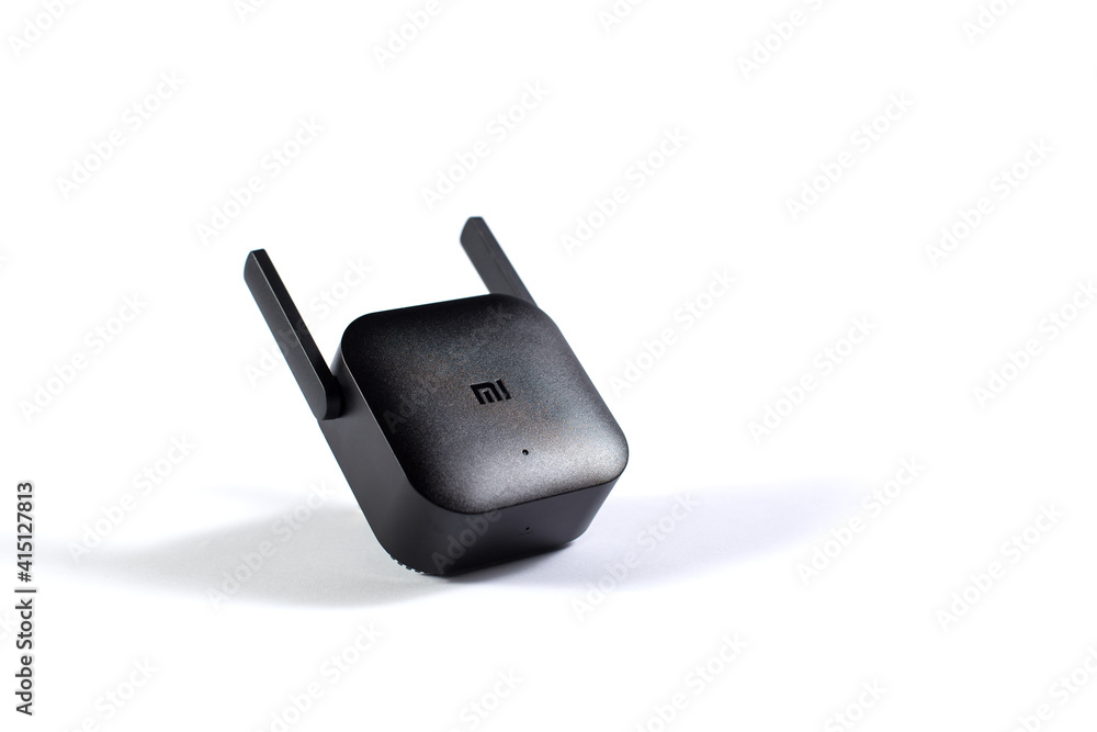 WiFi Amplifier Pro from Xiaomi. WiFi Amplifier isolated on a white. Stock  Photo | Adobe Stock