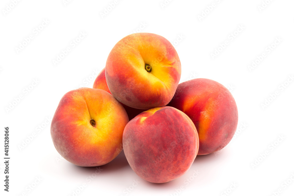Summer fruit background. Ripe juicy peaches on white background. Copy space. Fresh organic fruit vegan food. Harvest concept Summer fruit background. Ripe juicy peaches on white background. Copy space. Fresh organic fruit vegan food. Harvest concept