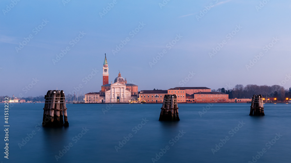 Venice Canal Grande at blue hour with view of church and tower