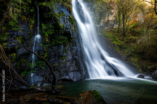 Quiet corner with silky waterfall 