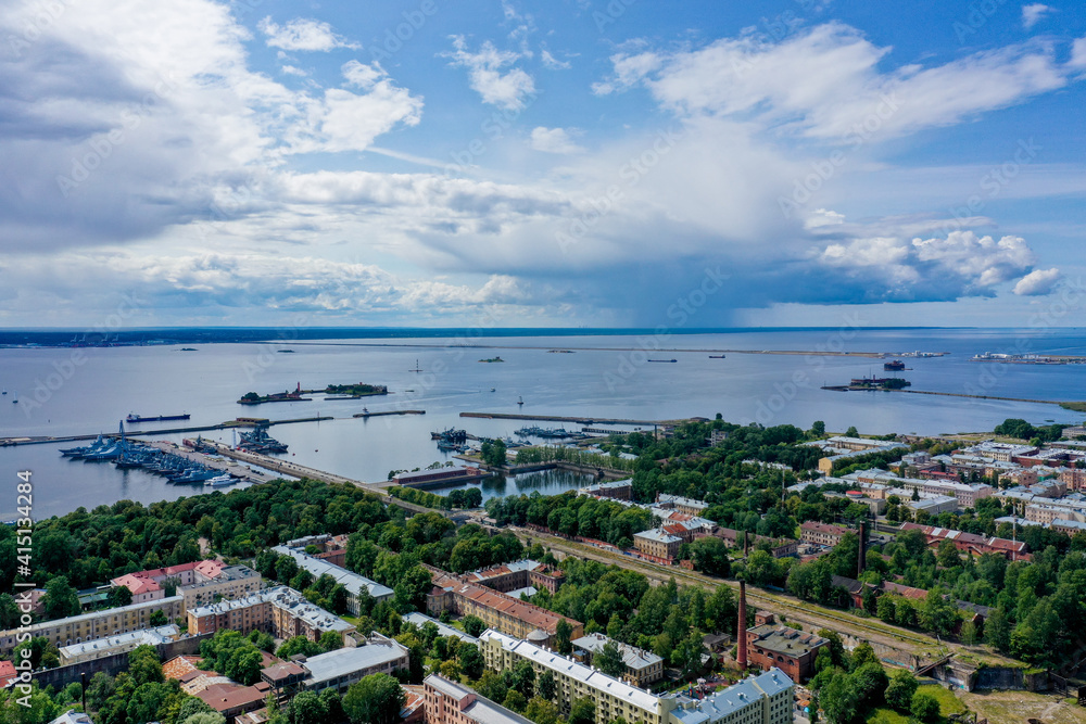 Panoramic view of Kronstadt from a height. The Gulf of Finland. Summer. Island of forts Kotlin. Panoramic view of Kronstadt from a height. The Gulf of Finland. Summer. Island of forts Kotlin.