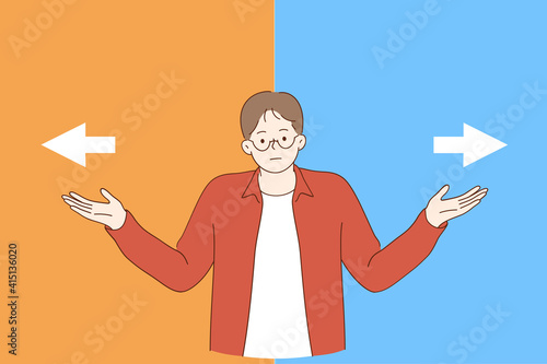 Doubt, Making decision, hard choice concept. Frustrated young man spreading outstretched arms trying to choose right or left direction and right way path to go feeling uncertain frustrated 