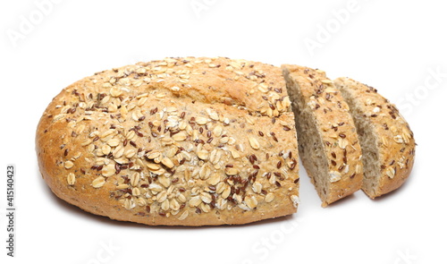 Integral wheat rye bread loaf with seeds and slices (linseed, oats) isolated on white background