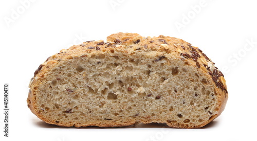 Integral wheat rye bread loaf with seeds (linseed and oats) sliced in half isolated on white background