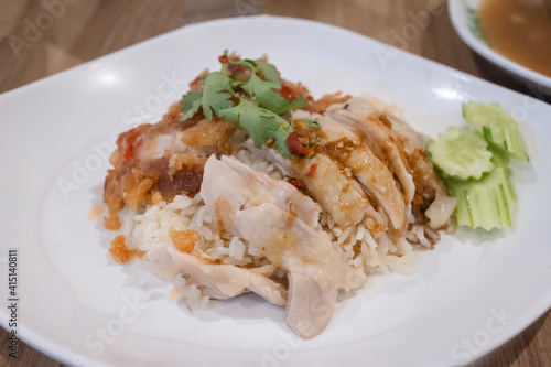 chopped steamed chicken and fried chicken on rice