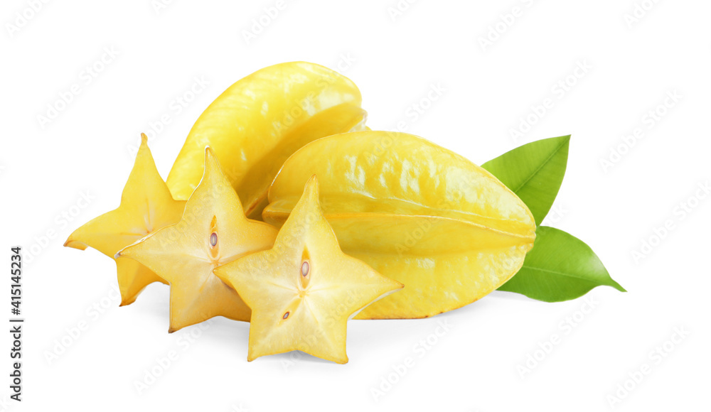 Cut and whole carambolas with green leaves on white background Cut and whole carambolas with green leaves on white background