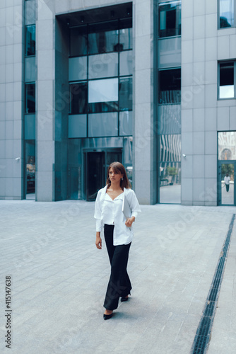 Young business woman in the city