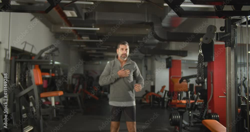 Exercising inside an indoor gym Exercising inside an indoor gym