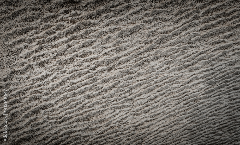 Fototapeta premium Embossed wall covered building materials. Background.