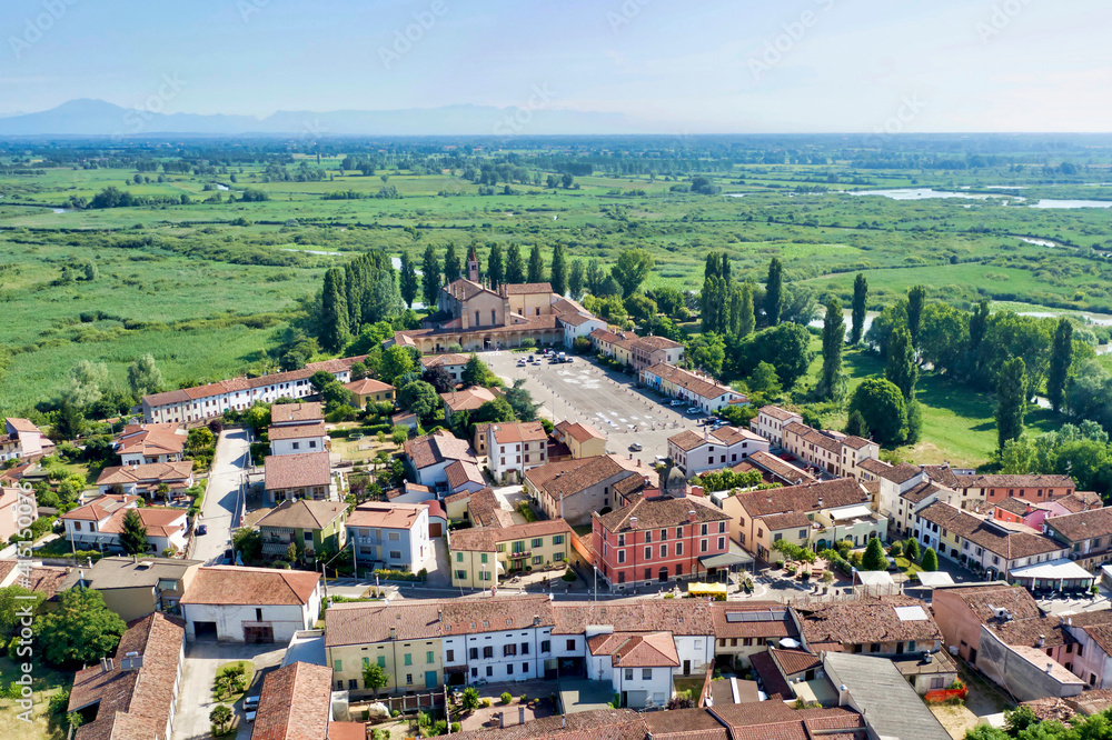 Italy, Mantova, Le Grazie village, Basilica and square, Mincio river valley in the background