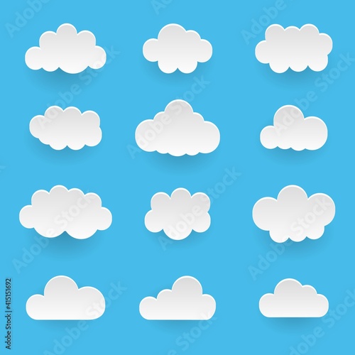 Vector set of white clouds over blue sky © Alex