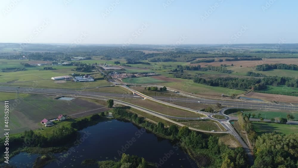 Highway with exit. Traffic on the drone shot.
Highway with exit. Traffic on the drone shot.