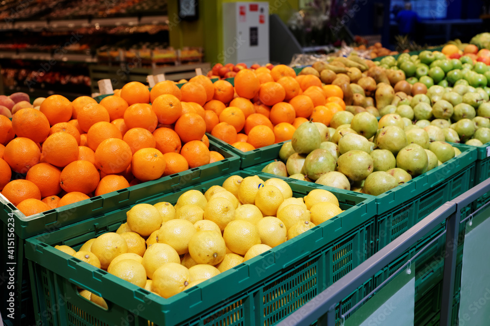 Shelf with citrus fruits