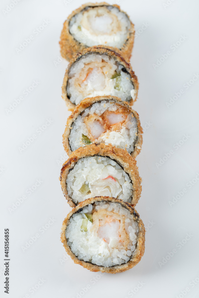 Crispy hot sushi rolls isolated on a white background Crispy hot sushi rolls isolated on a white background