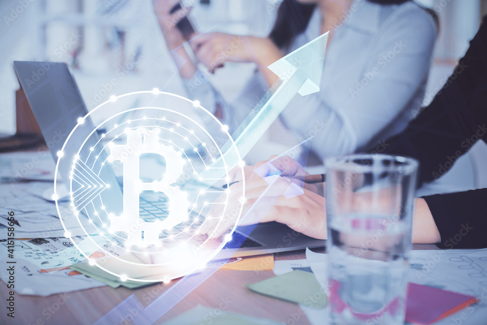 Double exposure of woman hands typing on computer and crypto market theme hologram drawing. Blockchain concept. Double exposure of woman hands typing on computer and crypto market theme hologram drawing. Blockchain concept.