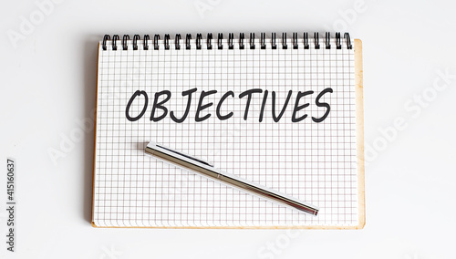Wallpaper Mural Text on notepad OBJECTIVES on white background. Business Concept Torontodigital.ca