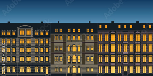 row of urban historical ancient town house facades colored illustration at night
