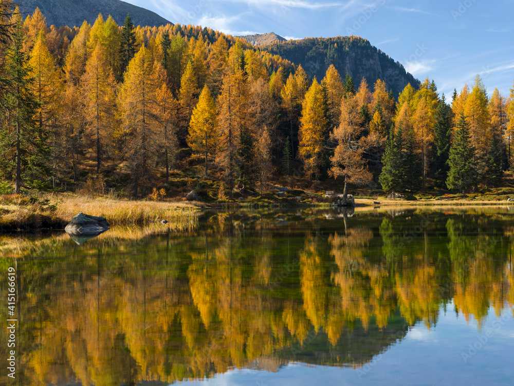 Lago San Pellegrino (Lech de San Pelegrin) during fall at Passo San Pellegrino in the Dolomites. Italy.