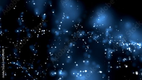 Blue dust particles floating over black