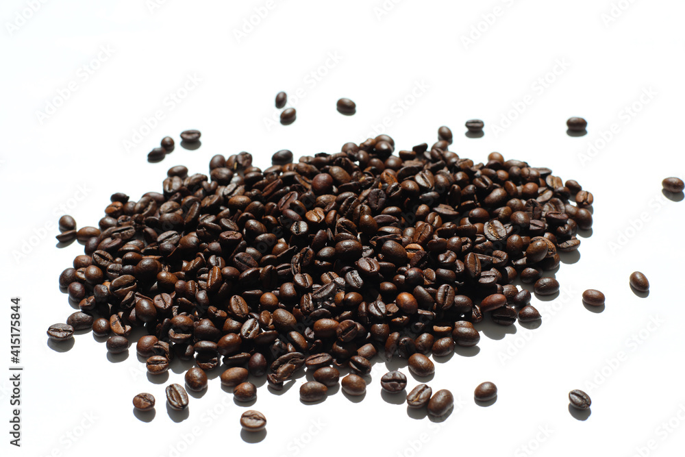 Textured background with robusta and arabica coffee beans closeup. Every day, people drink aromatic strong espresso in the morning. A popular world tradition in every country. Macro view backdrop Textured background with robusta and arabica coffee beans closeup. Every day, people drink aromatic strong espresso in the morning. A popular world tradition in every country. Macro view backdrop