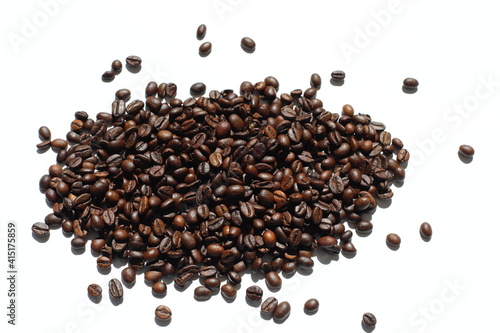 Textured background with robusta and arabica coffee beans closeup. Every day, people drink aromatic strong espresso in the morning. A popular world tradition in every country. Macro view backdrop