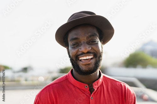 Happy african man having fun smiling in front of camera