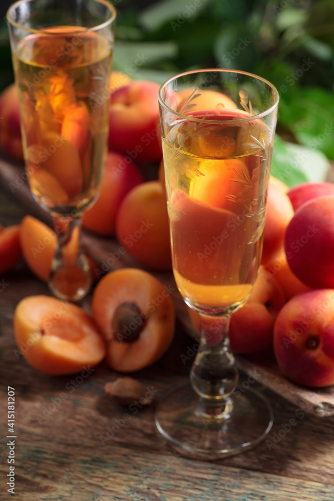 Fresh apricots and glasses apricot liquor. Fresh apricots and glasses apricot liquor.