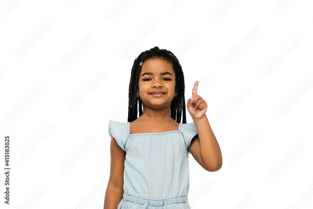 Pointing. Happy longhair brunette little girl isolated on white studio background with copyspace for ad. Looks happy, cheerful, sincere. Childhood, education, human emotions, facial expression concept Pointing. Happy longhair brunette little girl isolated on white studio background with copyspace for ad. Looks happy, cheerful, sincere. Childhood, education, human emotions, facial expression concept