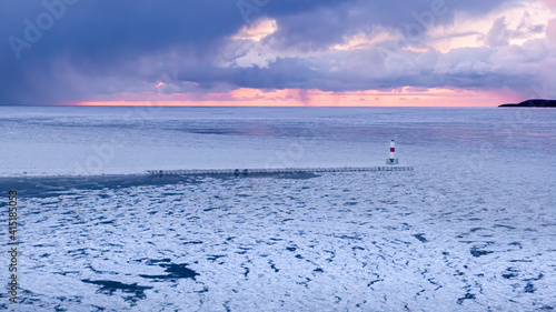 Obraz na płótnie Aerial view of Little Traverse Bay sunset in winter