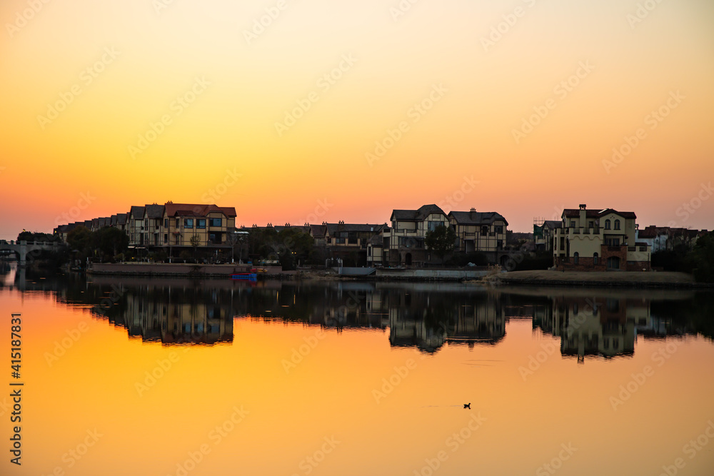 Sunset at lakeside houses