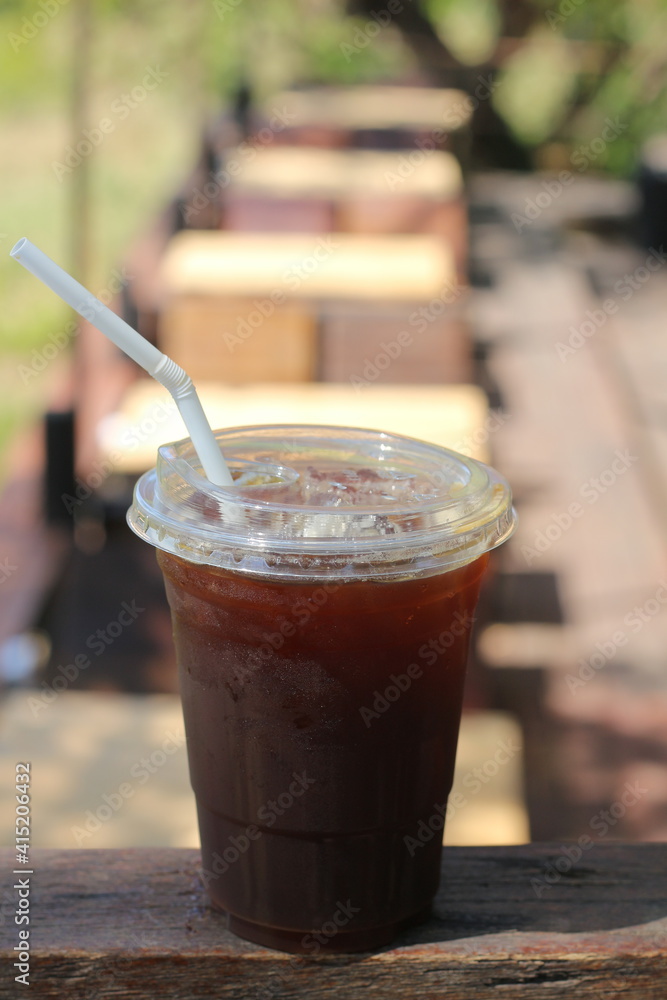 Iced americano coffee with ice on table at cafe. Iced americano coffee with ice on table at cafe.