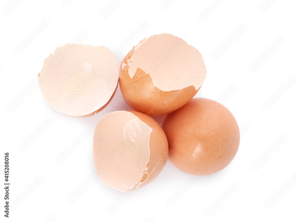 Egg shells on white background, top view. Composting of organic waste Egg shells on white background, top view. Composting of organic waste