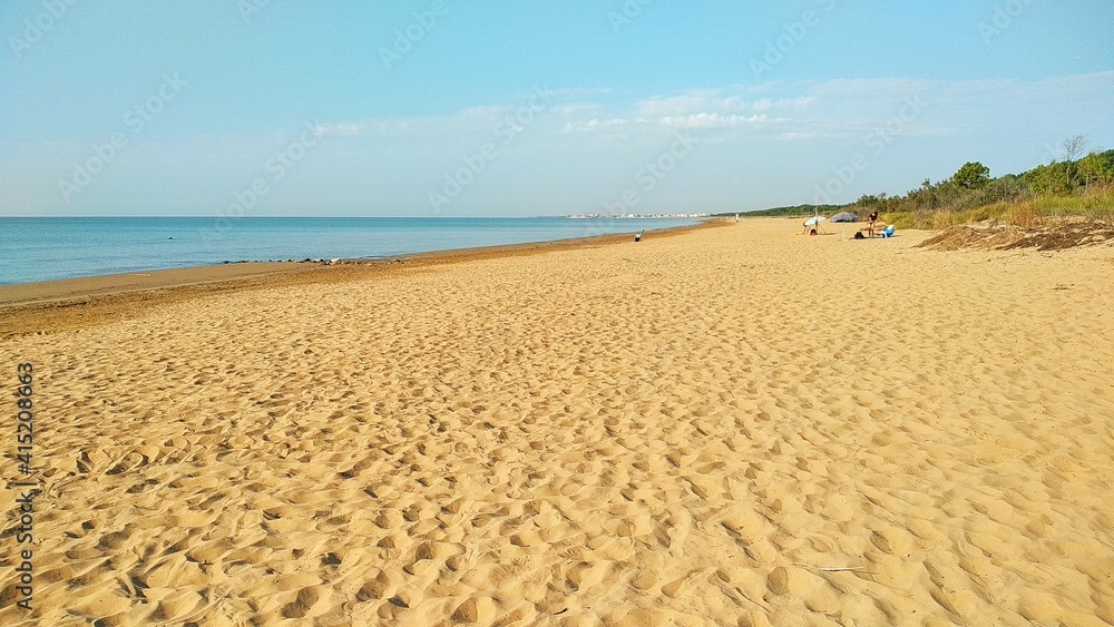Sand on a sunny beach in Italy