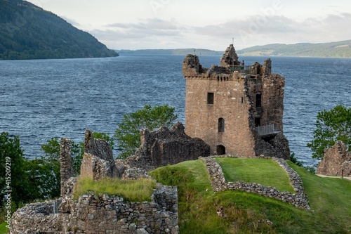 Ancient tower of Urquhart Castle in late afternoon near Drumnadrochit city in Scotland Highlands