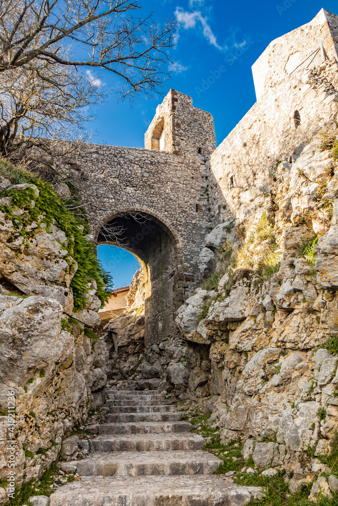 Medieval village of Castel San Pietro Romano, Lazio, province of Rome, Palestrina. A glimpse of the village, with the alley and the cobbled staircase. The arch formed by the stone bridge of the castle