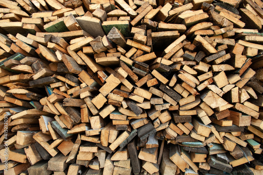 Wood Inside Sawmill. Wide banner or panorama wooden trunks. Sawmill.Natural sawn wood. The texture of the cut. Arranged boards in a sawmill. Harvesting firewood in the village. Pile of planks Wood Inside Sawmill. Wide banner or panorama wooden trunks. Sawmill.Natural sawn wood. The texture of the cut. Arranged boards in a sawmill. Harvesting firewood in the village. Pile of planks